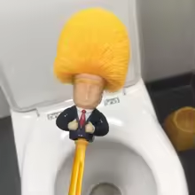 Cartoon toilet brush in use on toilet